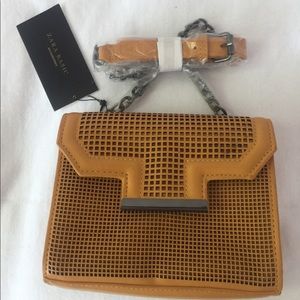 Zara mustard mini shoulder bag with long handle.